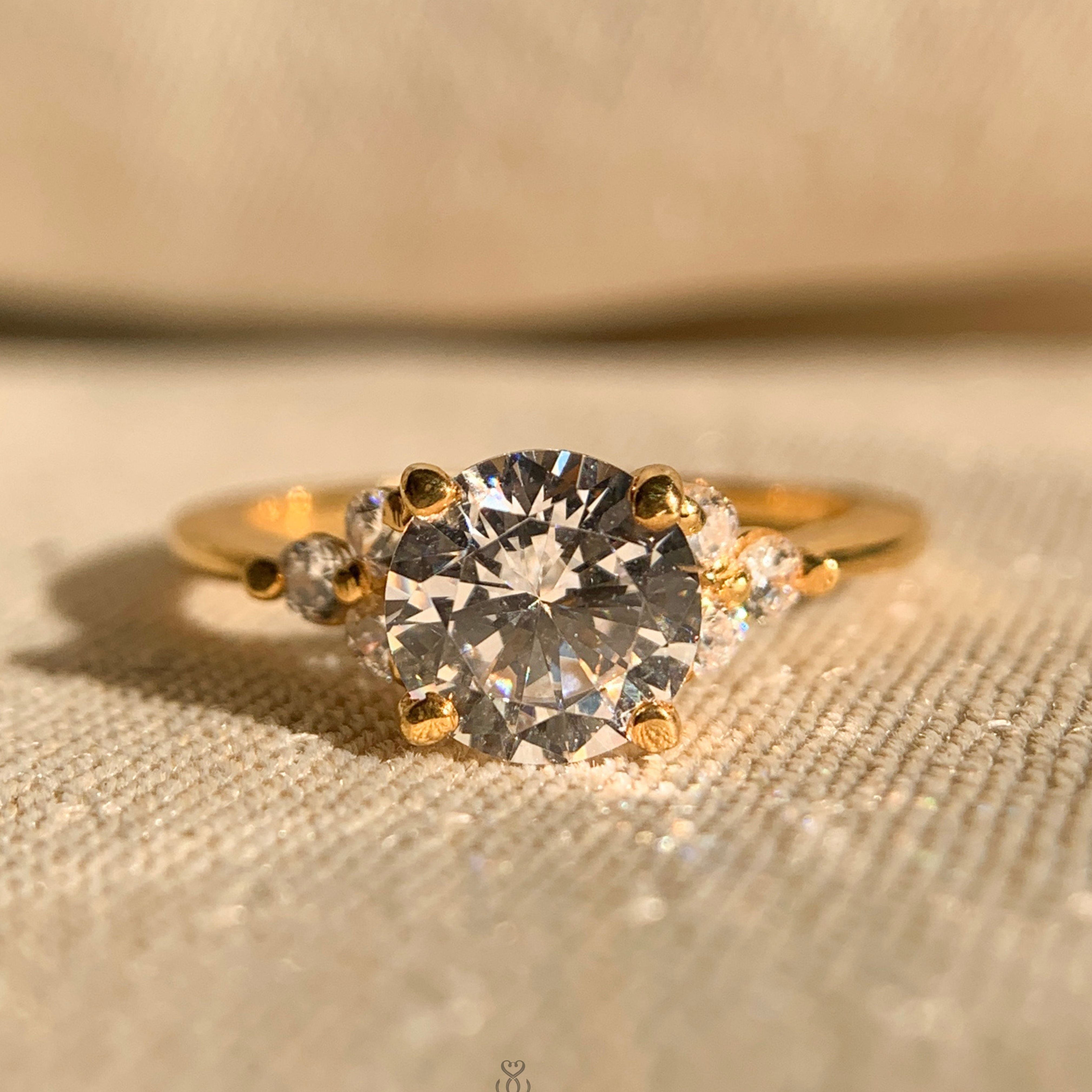 Round Cut Moissanite Engagement Ring with Side Stones in White Gold